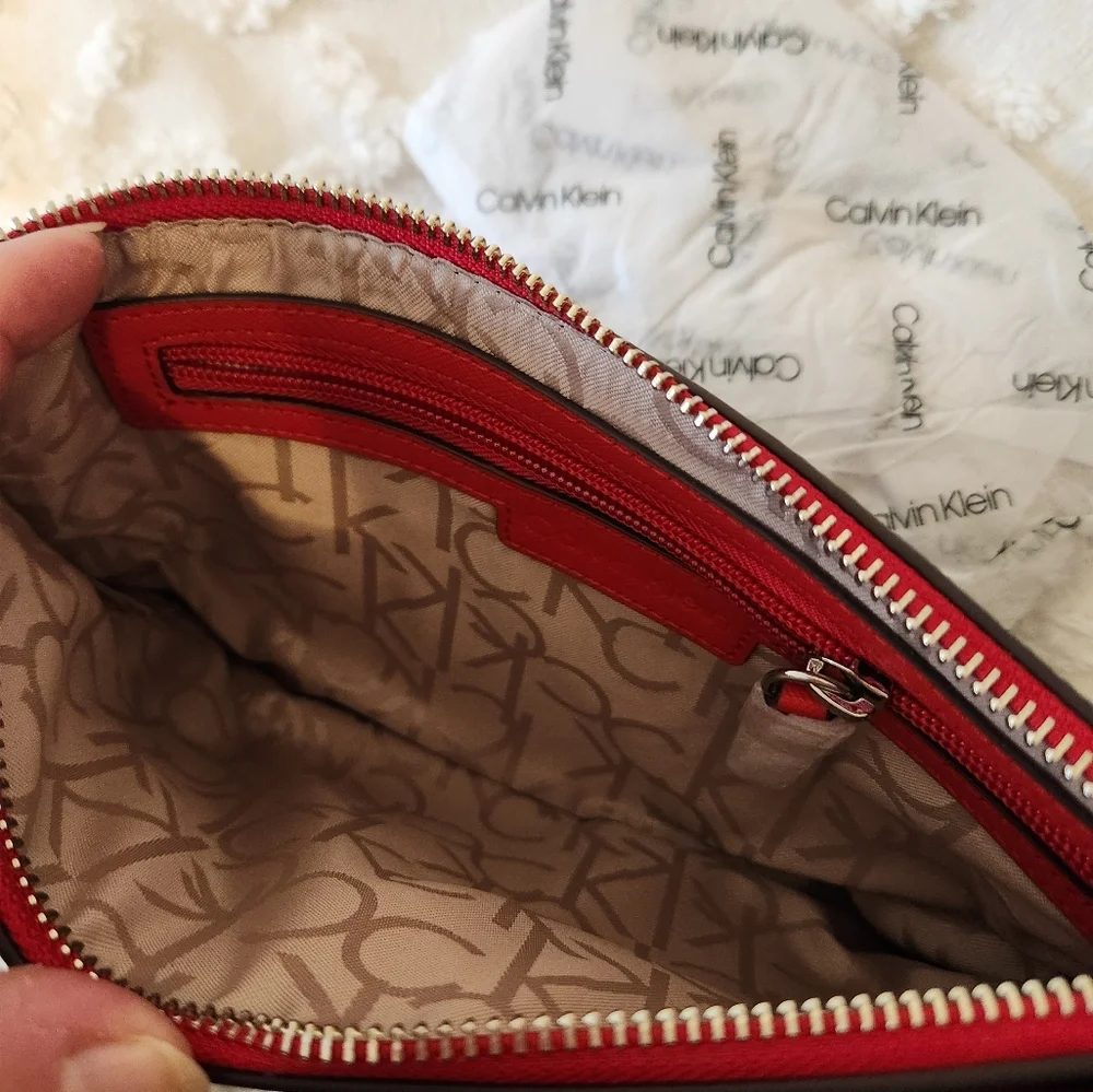 NWT CALVIN KLEIN wristlet.  GREAT COLORS.   10 X 6.5 ORIGINAL PACKING